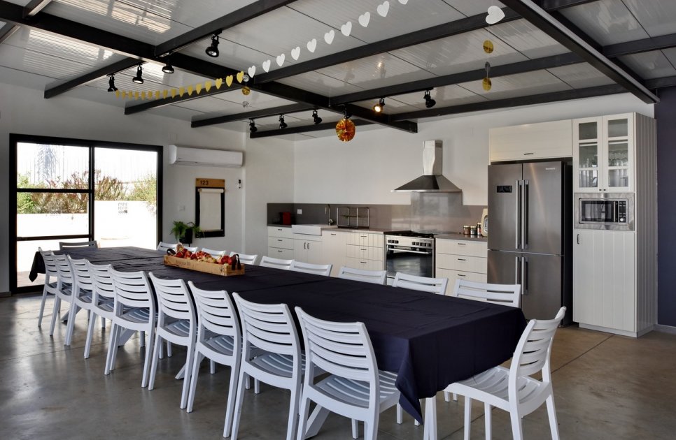 Table for 25 and a full kitchen in the shared space