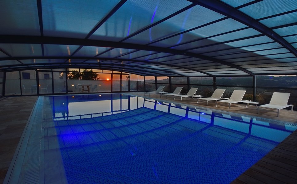 The covered pool at sunset